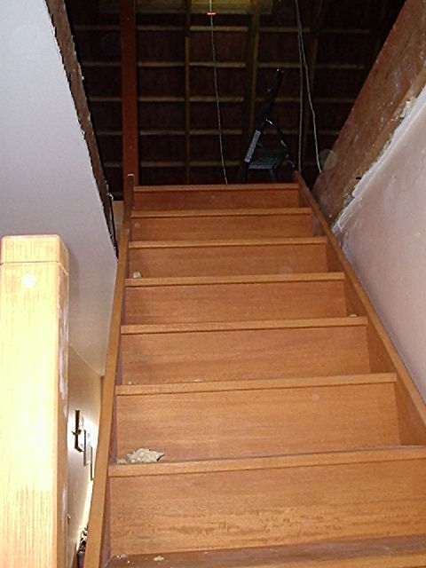 Mise en place de l'escalier bois dans la trémie