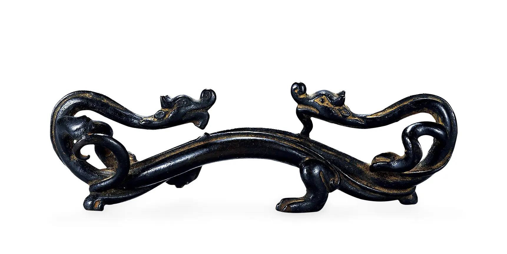 A Chinese Bronze Brush Pot in the Form of a Dragon A Chinese Bronze Brush Pot in the Form of a Dragon