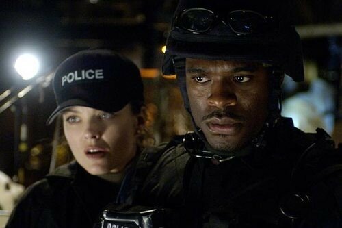 Dina Meyer (tuée dans Saw 3) & Lyriq Bent, la nouvelle victime (?)