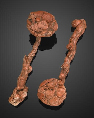 Two carved coral ruyi scepters, Late Qing dynasty