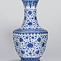 A rare large blue and white ‘lotus scroll’ <b>hexagonal</b> <b>vase</b>, Qianlong six-character seal mark and of the period (1736-1795)