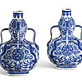 A pair of blue and white '<b>dragon</b>' <b>double</b>-<b>gourd</b> <b>vases</b>, Qianlong seal marks and period (1736-1795)