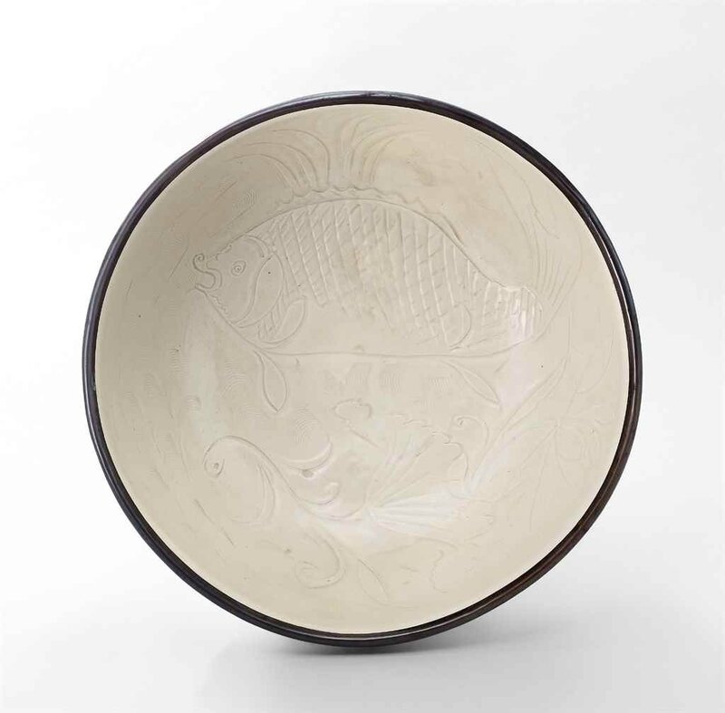 A large Ding carved 'Fish' bowl, Northern Song dynasty (960-1127)