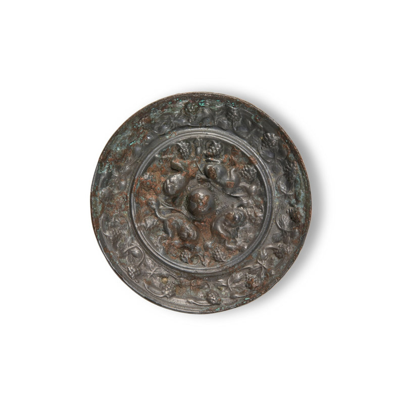 A bronze 'lion and grapevine' mirror, Tang dynasty