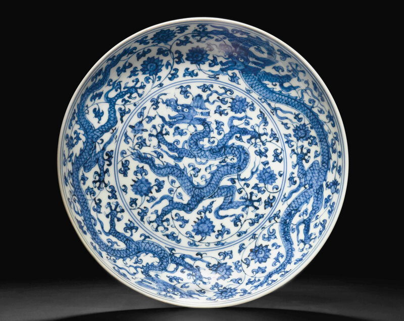A blue and white 'dragon' dish, Zhengde four-character mark in underglaze blue within a double circle and of the period (1506-1521)