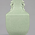 A rare celadon-glazed incised 'lotus' archaistic <b>square</b> <b>vase</b>, Qianlong incised seal mark and period (1736-1795)