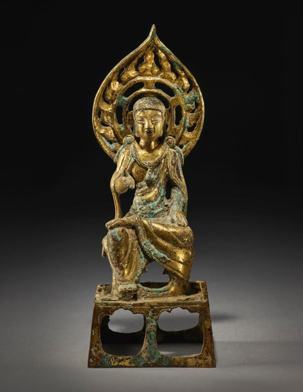 A gilt-bronze figure of a seated Bodhisattva, Sui-Tang dynasty