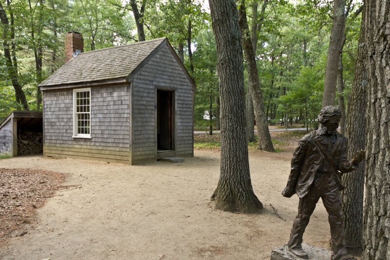 Henry David Thoreau - Replica his _cabin_near_Walden_Pond_and_his_statue