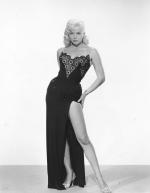 diana_dors-1957-by_wallace_seawell-siting1-01-3