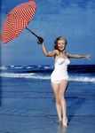 1949_tobey_beach_by_dedienes_umbrella_red_010_3
