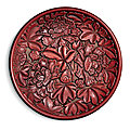 A magnificent carved cinnabar lacquer 'hibiscus' dish, <b>Yuan</b>-<b>Early</b> <b>Ming</b> <b>dynasty</b>, 14th century