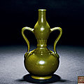 A teadust-glazed <b>gourd</b>-shaped vase with handles, Qianlong mark and period (1736-1795)