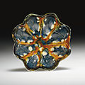 A small blue, <b>amber</b> <b>and</b> <b>clear</b>-glazed pottery bowl, Tang dynasty (618-907)