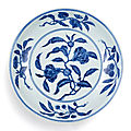 A very rare blue and white 'pomegranate' <b>dish</b>, mark and period of Xuande (1426-1435)