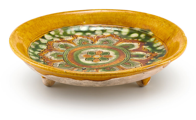 A sancai 'lotus' tripod dish, Tang dynasty (618-906)