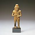 <b>Standing</b> <b>Figure</b> Holding Ceremonial Staff, Olmec, Mexico, 900-600 BC
