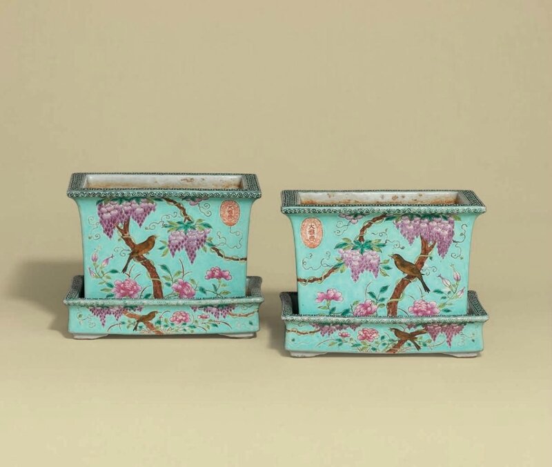 A pair of dayazhai famille rose turquoise ground rectangular jardinières and stands, Guangxu period (1875-1908), Four-character yong qing chang chun marks in iron-red