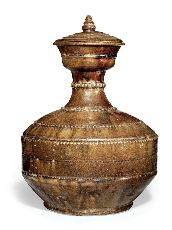 A rare amber-brown-glazed bottle and cover, Liao dynasty, 10th century
