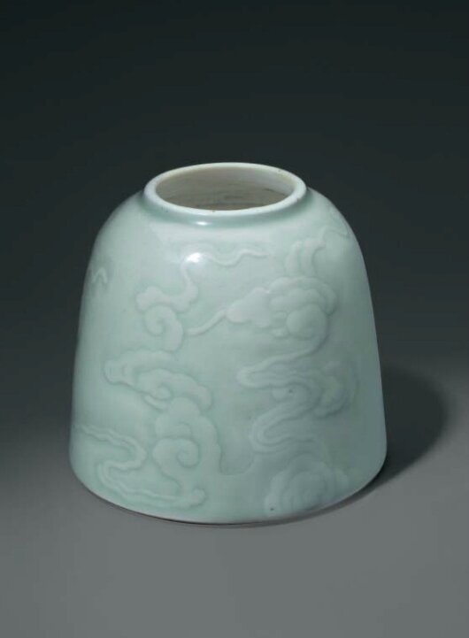 A celadon-glazed carved domed water pot, China, Qing dynasty, 18th century