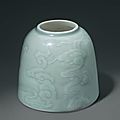 A celadon-glazed carved domed water pot, China, Qing dynasty, 18th century 