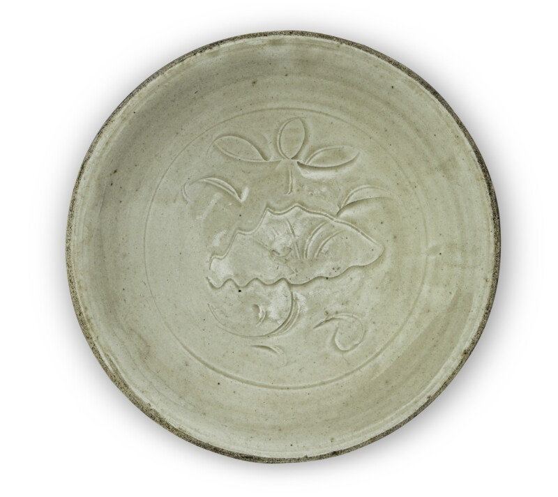A carved 'Ding' 'lotus' dish, Northern Song-Jin dynasty (960-1234)
