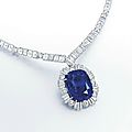 An impressive 90.97 carats <b>Ceylon</b> cushion-shaped <b>sapphire</b> and diamond pendant necklace
