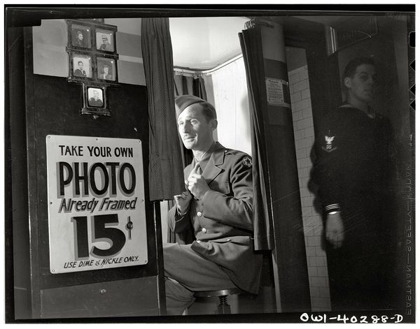15-cent-photo-booth-in-the-lobby-at-the-united-nations-service-center-at-washington-d-c-december-1943