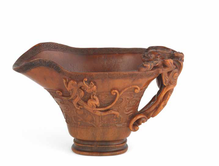 A rare archaistic rhinoceros horn libation cup, Ru yu two-character mark, 17th-18th century