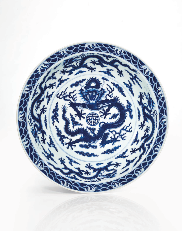 A rare and important imperial blue and white 'dragon' dish, Qing dynasty, Qianlong six-character seal mark in underglaze blue and of the period (1736-1795)