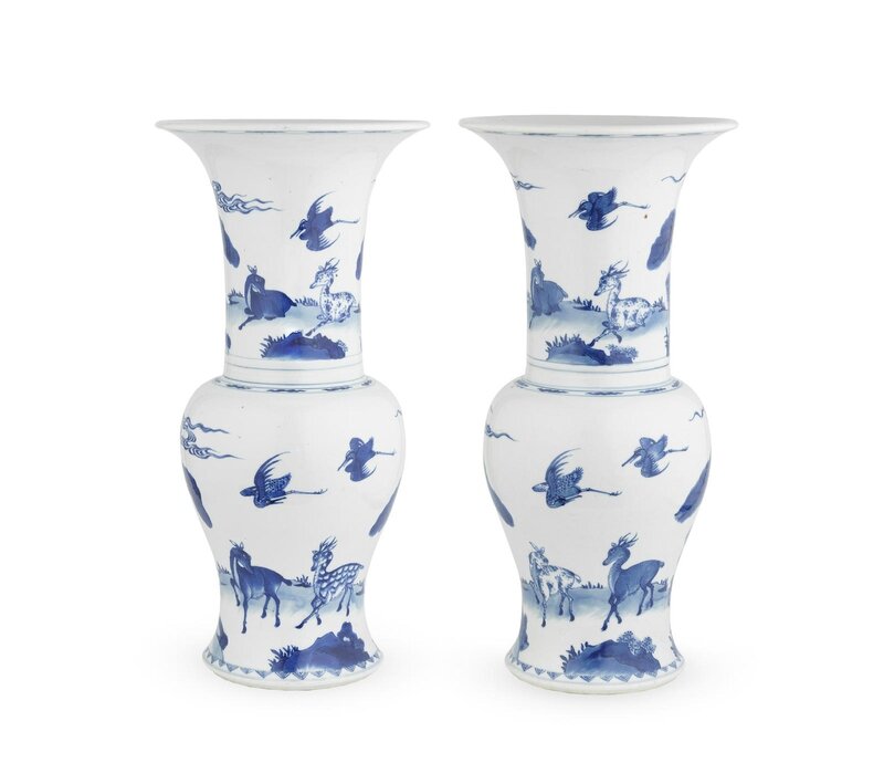 A pair of blue and white 'deer and cranes' 'phoenix-tail' vases, Kangxi period (1662-1722)