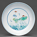 A rare doucai '<b>Swallows</b> and Lotus pond' dish, Yongzheng six-character mark and of the period (1723-1735)