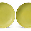 A pair of incised lemon-yellow-glazed 'dragon' dishes, <b>Guangxu</b> <b>marks</b> <b>and</b> <b>period</b> (1875-1908)
