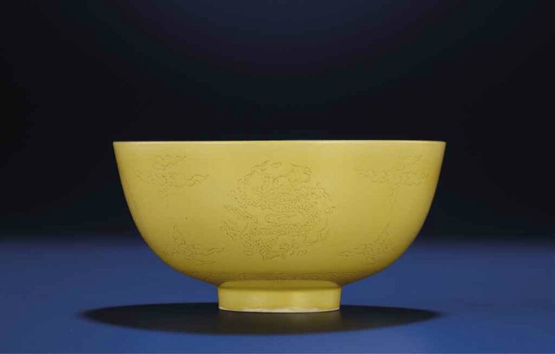 A fine rare incised yellow-glazed 'dragon' bowl, Kangxi six-character mark within double-circles and of the period (1662-1722)