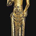 A rare and finely cast gilt-bronze figure of Acuoye Guanyin, <b>Dali</b> <b>Kingdom</b>, Yunnan province, 12th century