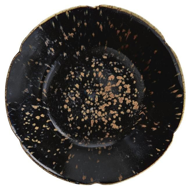 An exceptional Ding-type russet-splashed black-glazed foliate dish, Northern Song dynasty (960-1126)