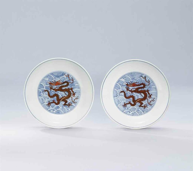 Two iron-red and underglaze-blue decorated 'dragon' dishes, Qianlong six-character seal marks in underglaze blue and of the period (1736-1795)