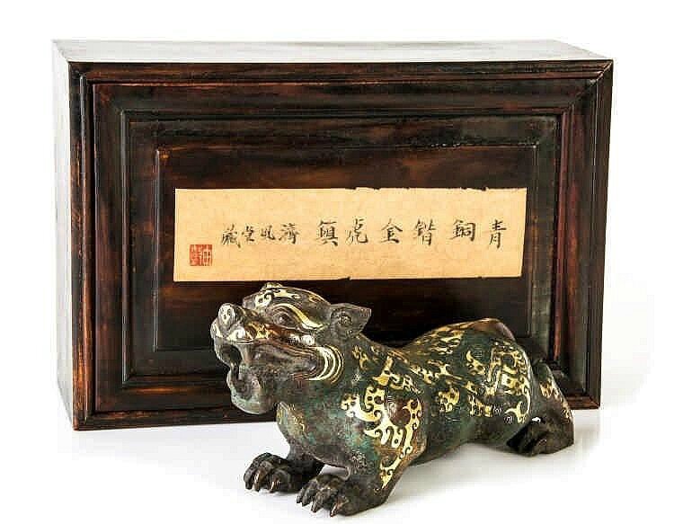 A bronze model of a tiger, Warring States-Western Han style 2