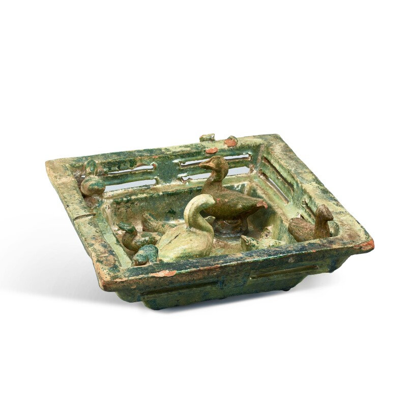 A green-glazed 'duck pond' square tray, Han dynasty (206 BC-220 AD)