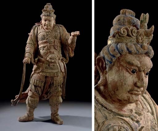 A_large_painted_wood_figure_of_a_Guardian_King__Song_Yuan_dynasty__13th_14th_century