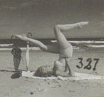 1949_tobey_beach_by_dedienes_umbrella_red_079_1