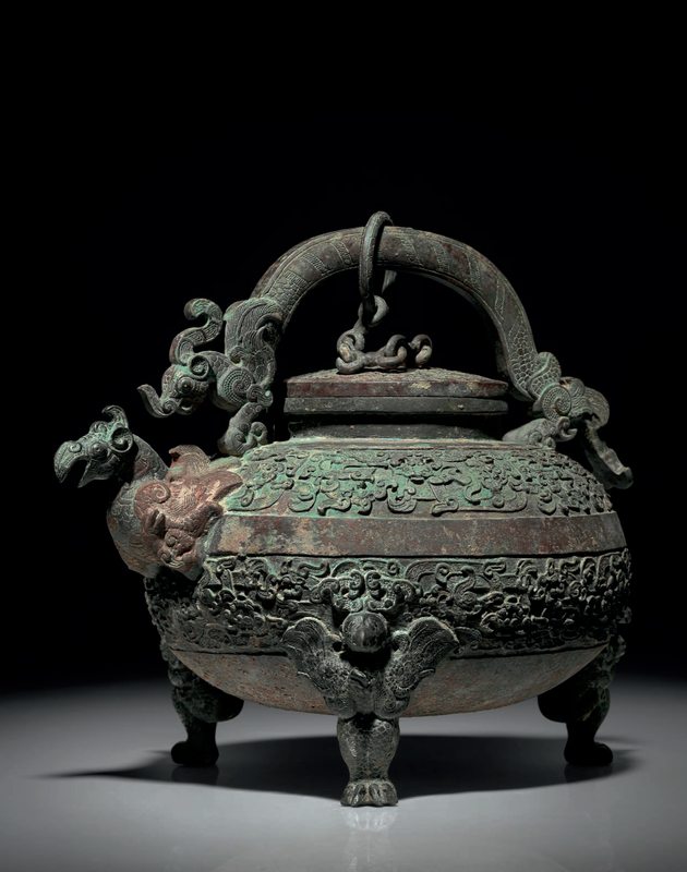 A rare finely cast tripod ewer and cover, he, Warring States period (475-221 BC)