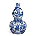 A blue <b>and</b> white double-gourd 'Eight Daoist Immortals' vase, <b>Mark</b> <b>and</b> <b>period</b> <b>of</b> <b>Wanli</b> (1573-1619)