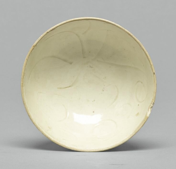 A small carved 'Ding' bowl, Song dynasty