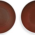 A pair of <b>copper</b>-<b>red</b> <b>glazed</b> dishes, marks and period of Yongzheng (1723-1735)