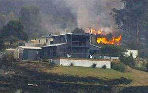 Les personnes fuient les incendies en Tasmanie 3