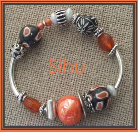 bracelet_afric_noir_et_orange_et_m_tal