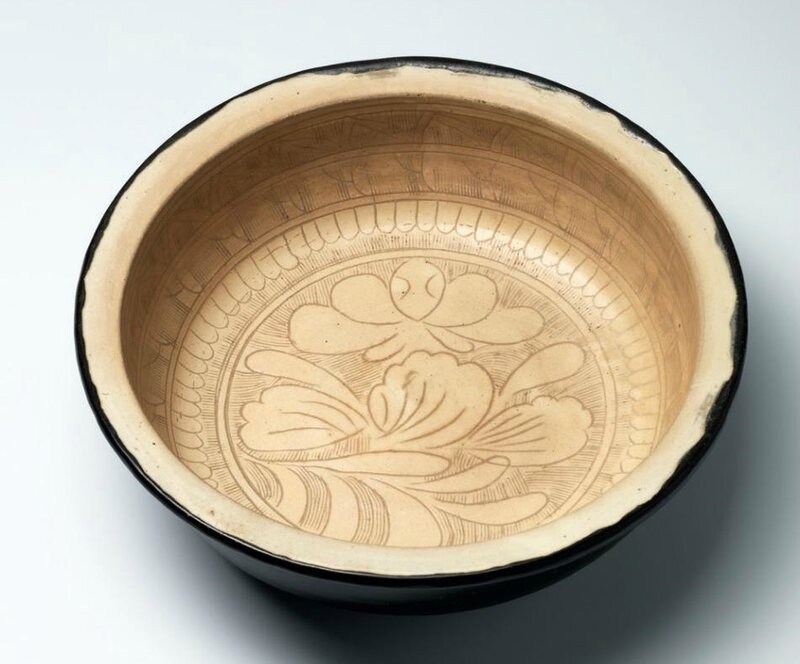 A rare Cizhou carved 'lotus' basin, Northern Song-Jin dynasty (960-1234)