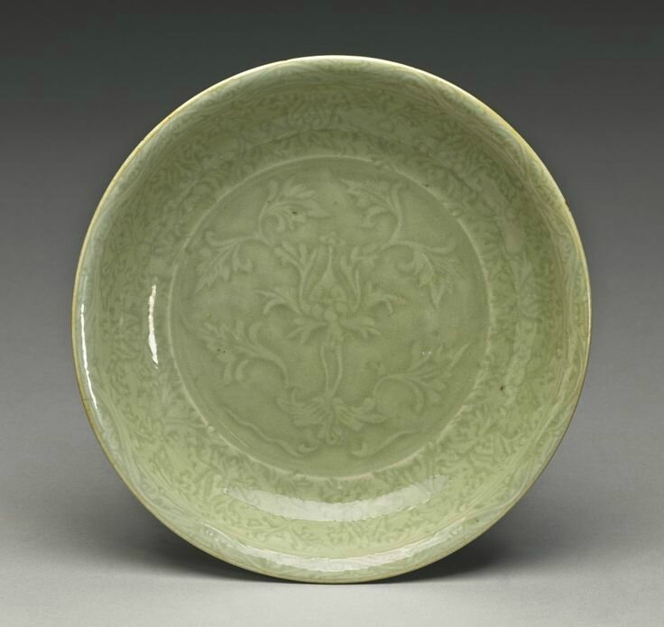 A 'Longquan' celadon molded 'Lotus' dish, Ming Dynasty