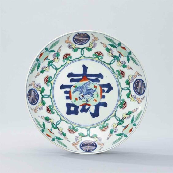 A doucai 'birthday' dish, Kangxi six-character mark in underglaze blue within a double circle and of the period (1662-1722)
