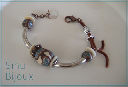 Bracelet__fimo_et_cuir_fleur_bleue_1
